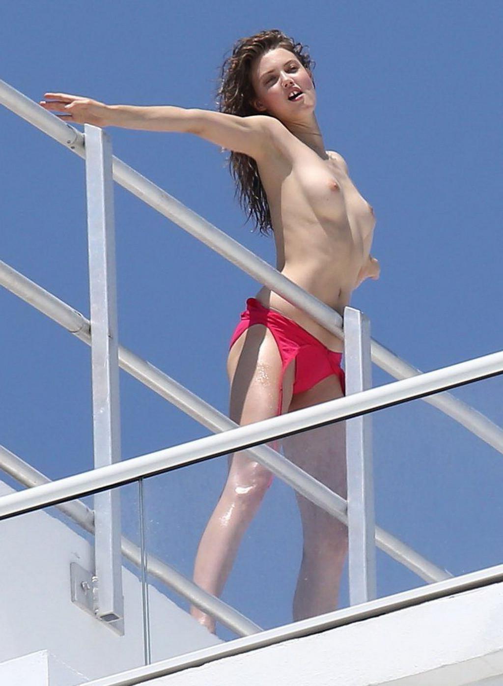 16P Lindsey Wixson topless rooftop photoshoot
