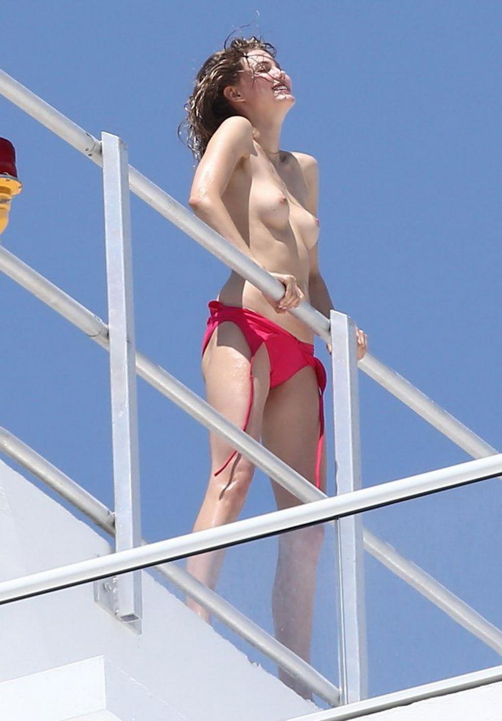 16P Lindsey Wixson topless rooftop photoshoot