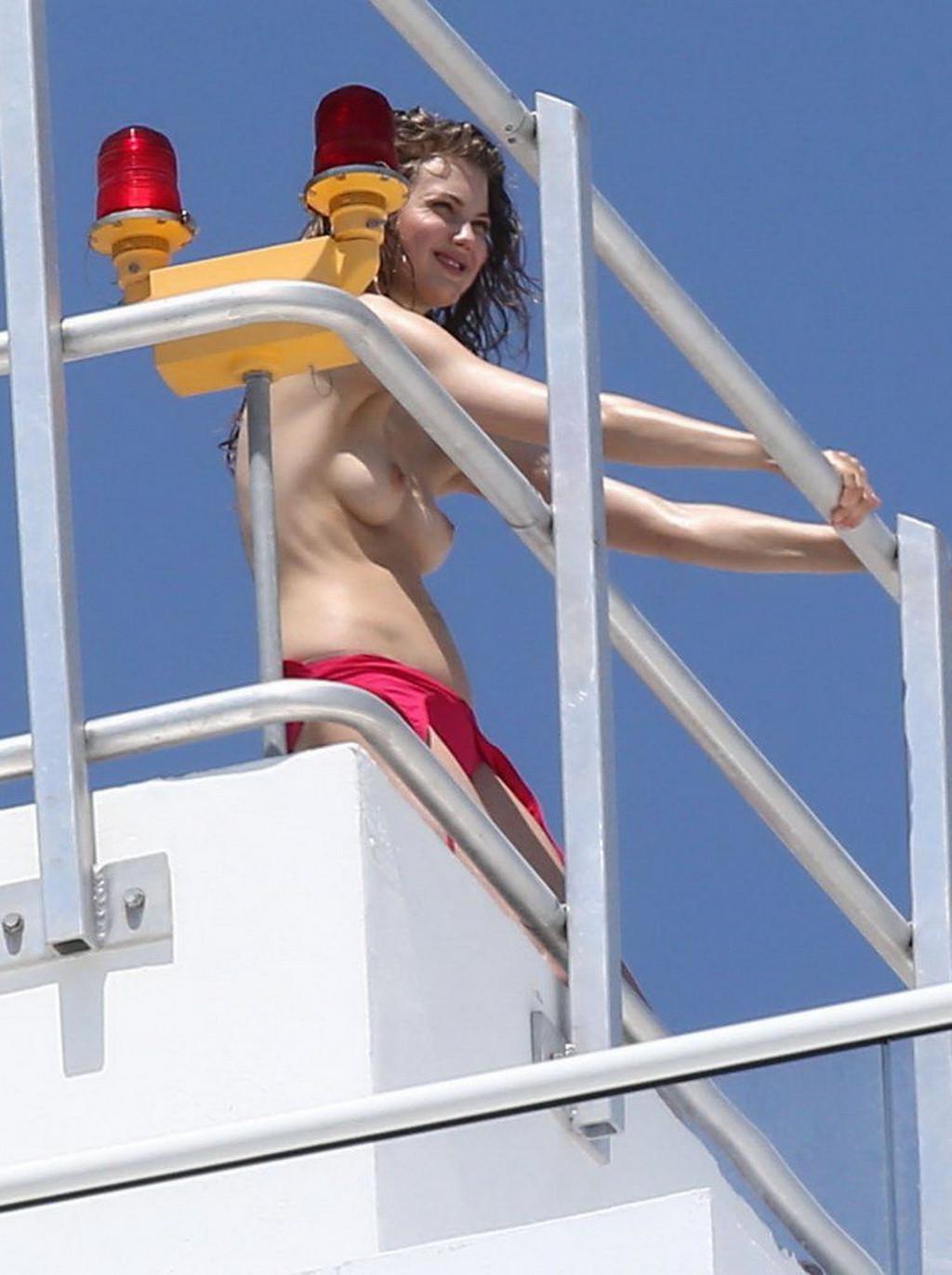 16P Lindsey Wixson topless rooftop photoshoot