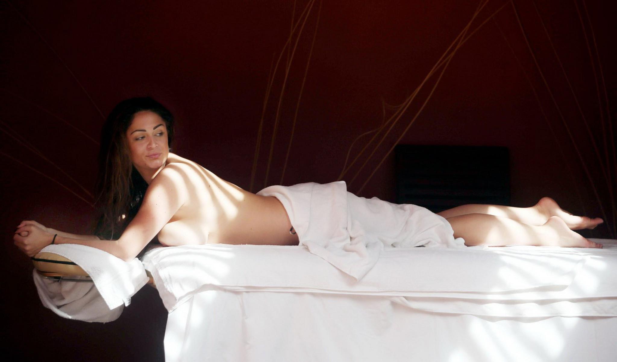 16P Casey Batchelor caught topless poolside at Canaries