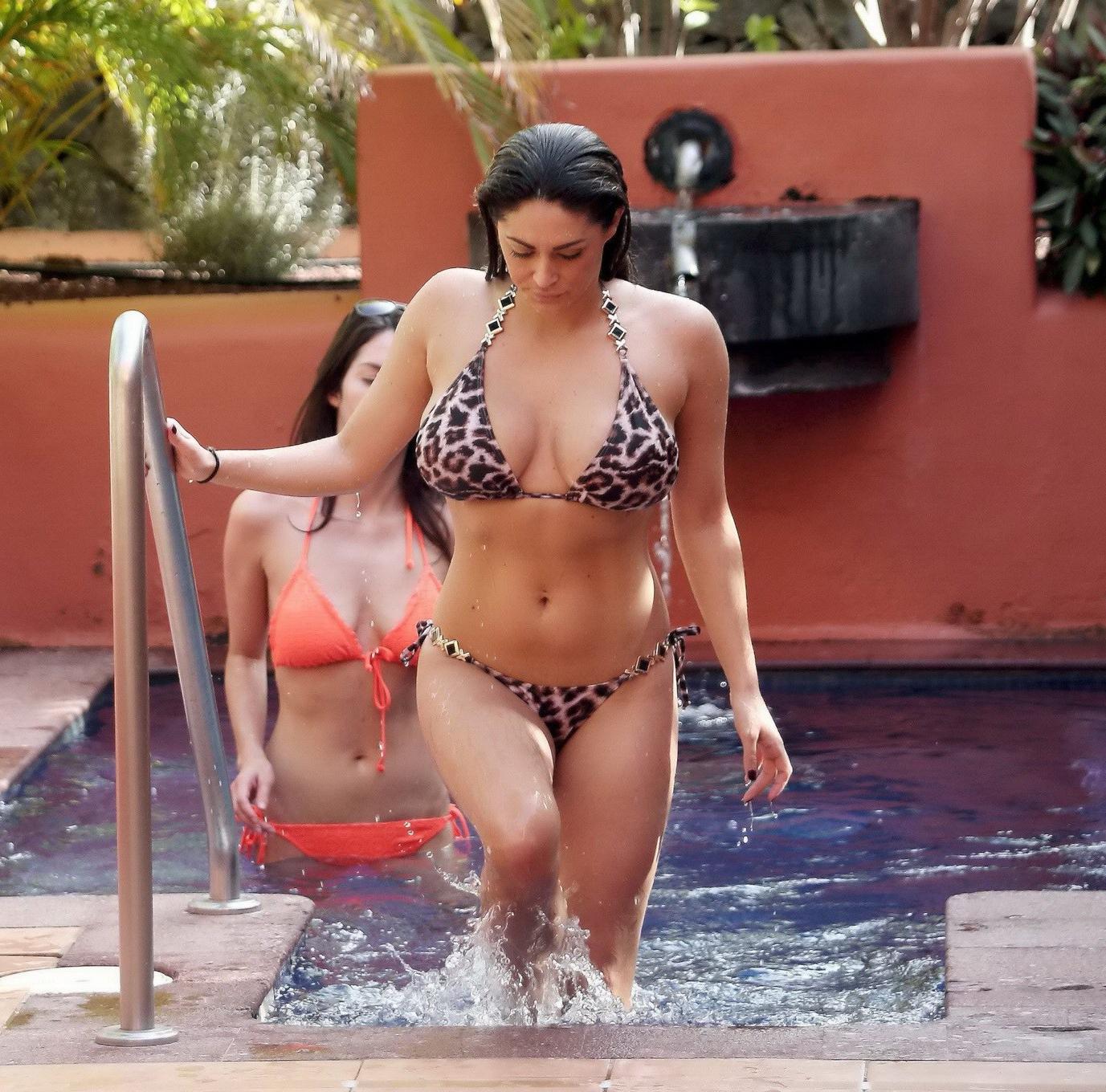16P Casey Batchelor caught topless poolside at Canaries