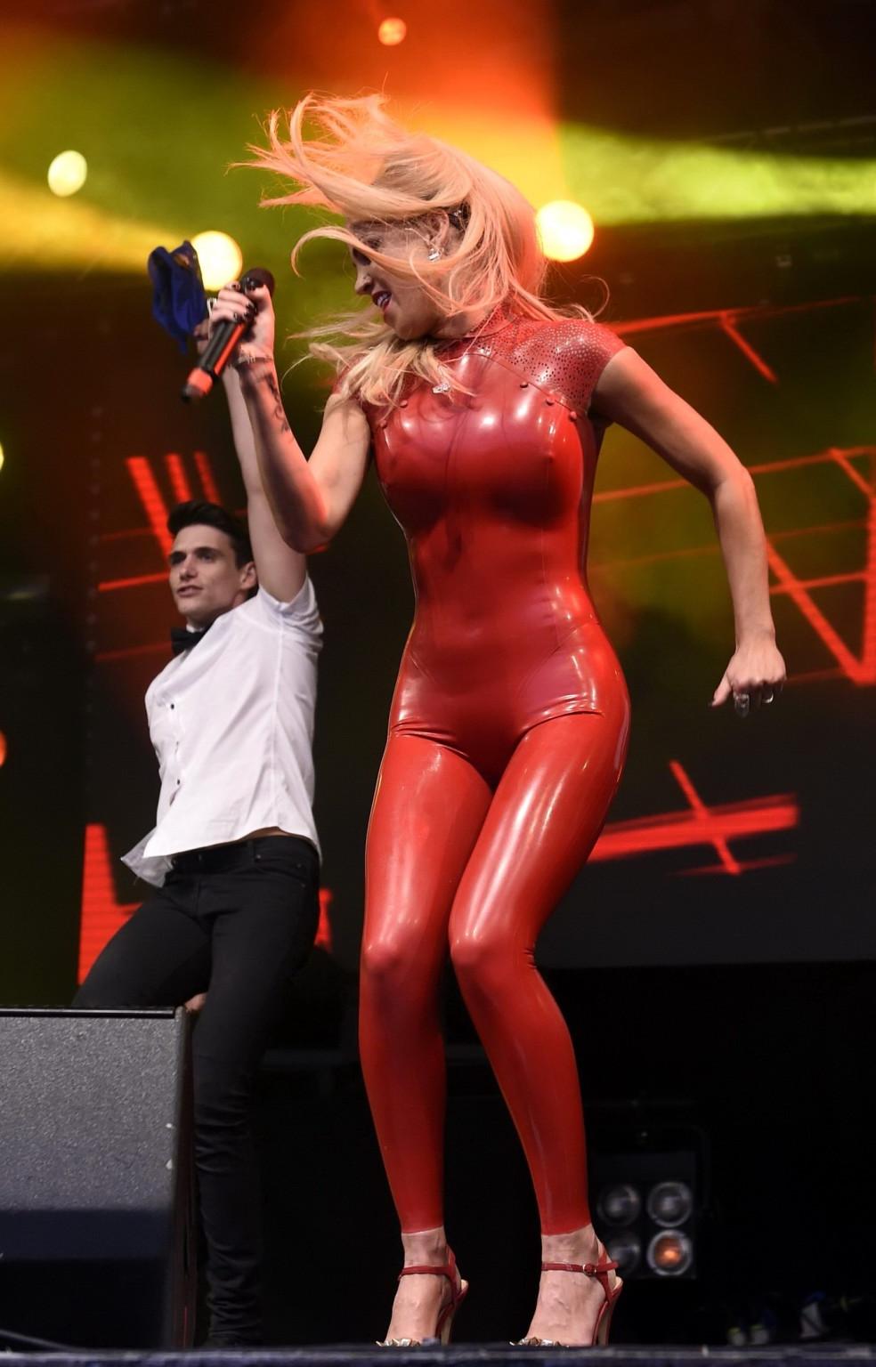 16P Sarah Harding in red latex catsuit performing at PRIDE