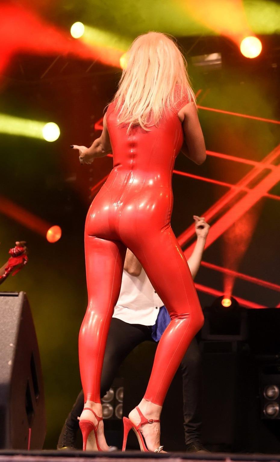 16P Sarah Harding in red latex catsuit performing at PRIDE
