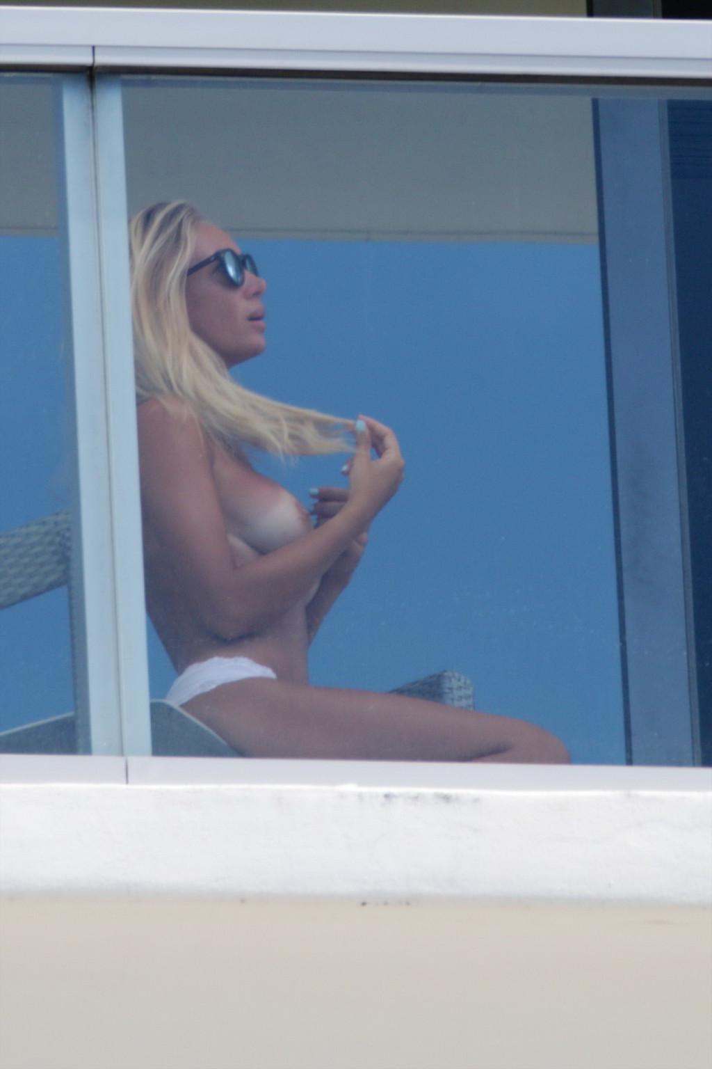 16P Laura Cremaschi caught topless at hotel balkony in Miami