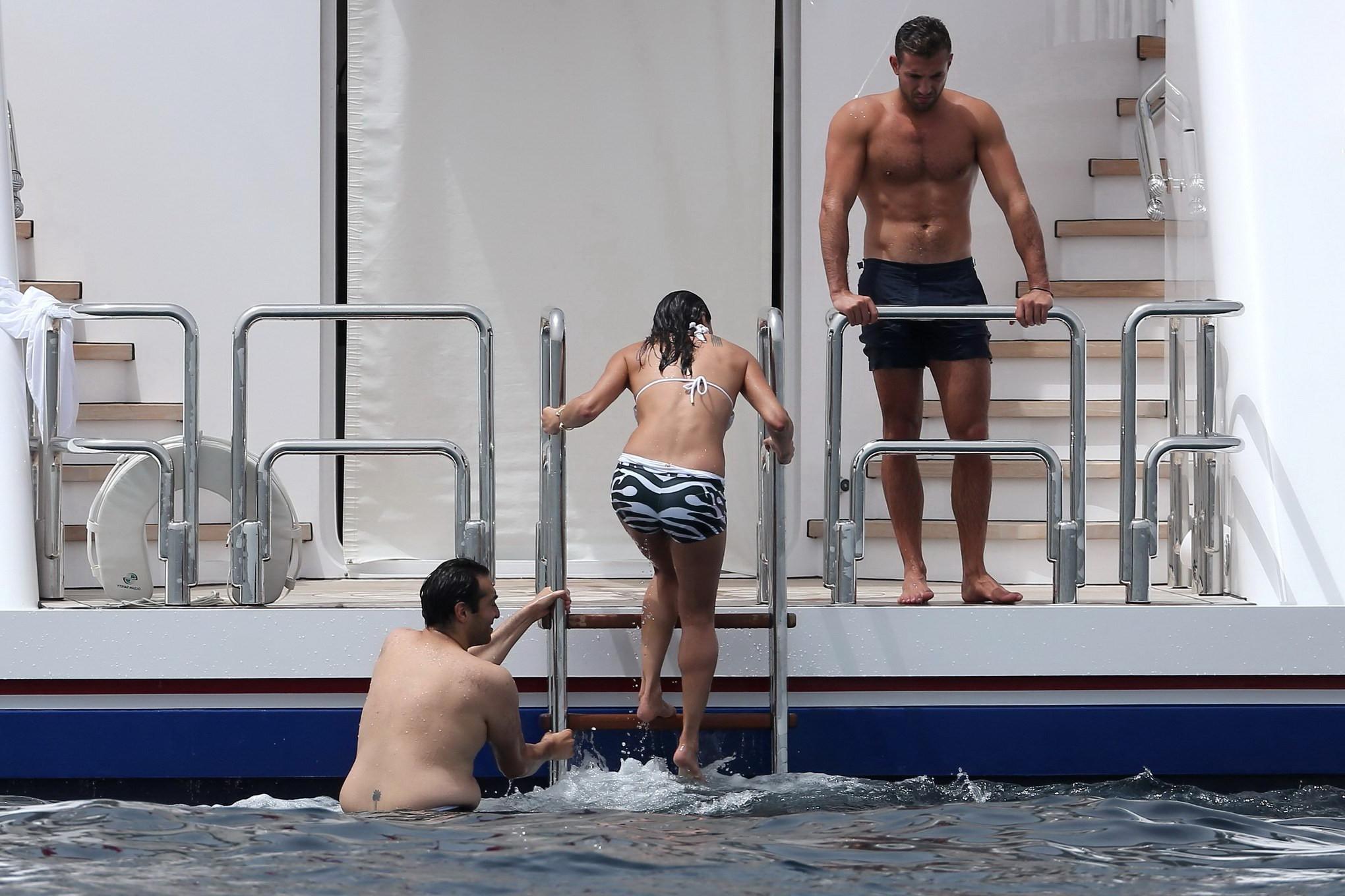 16P Michelle Rodriguez wearing a monochrome bikini in Spain