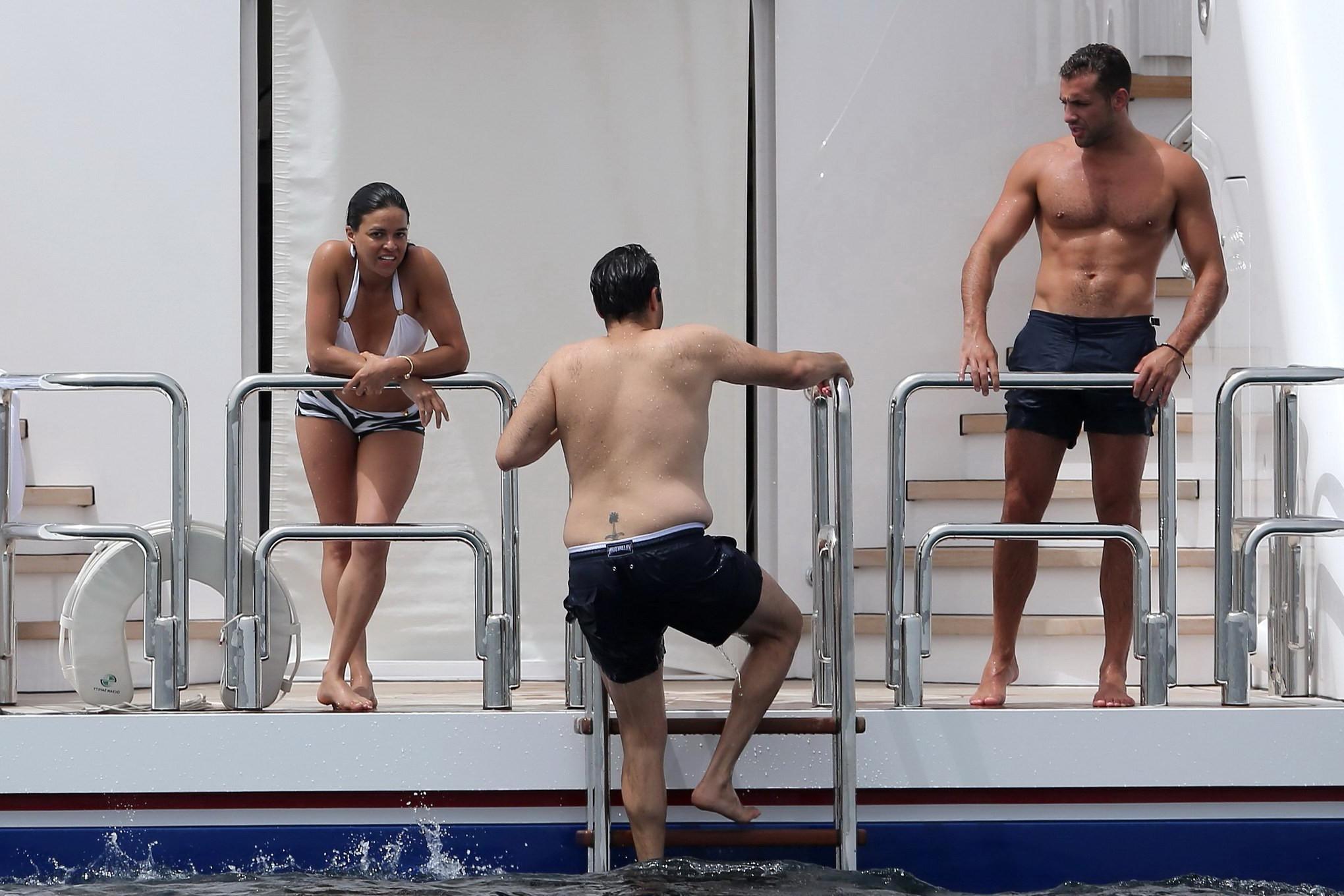 16P Michelle Rodriguez wearing a monochrome bikini in Spain