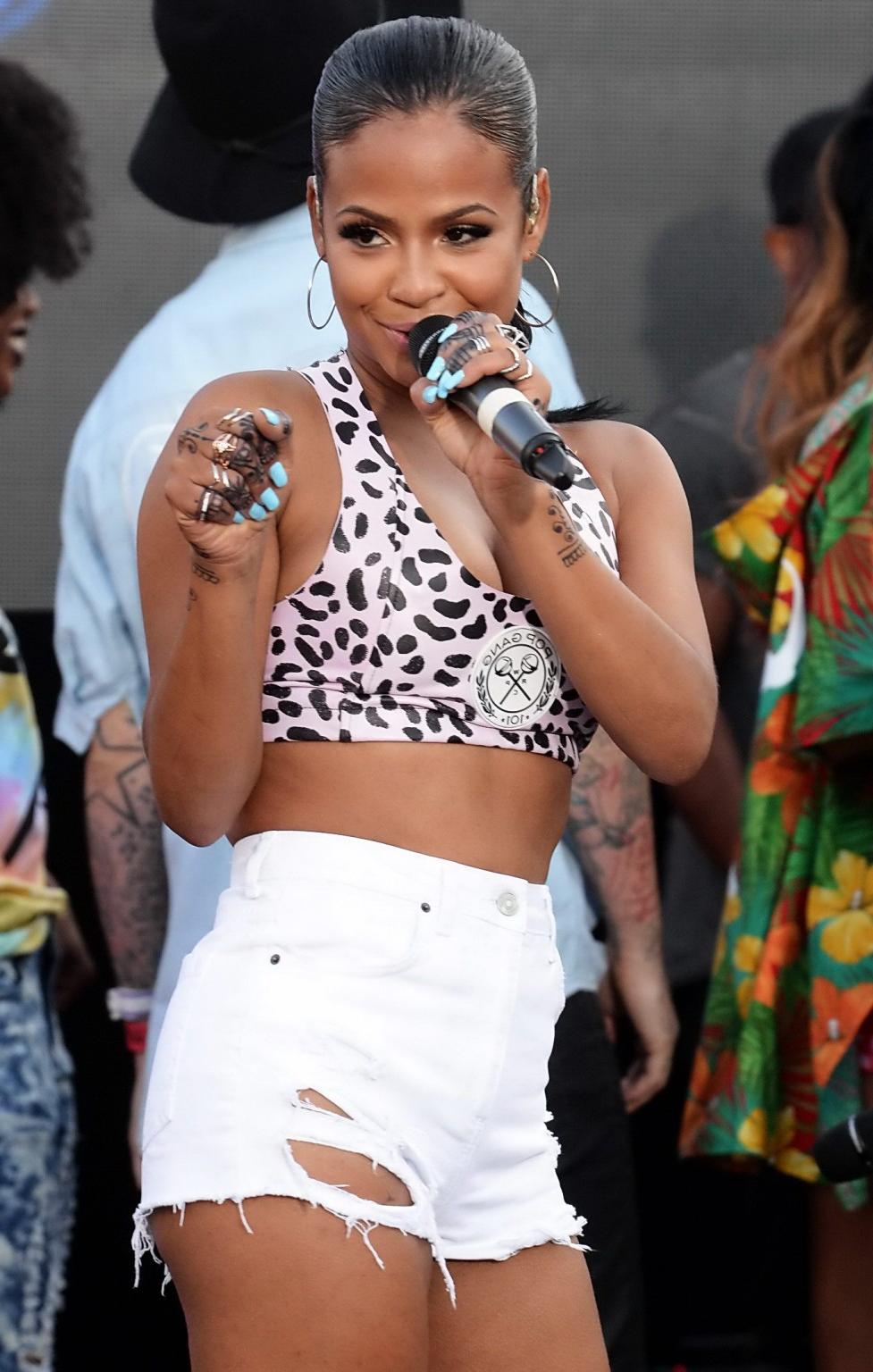 16P Christina Milian busty in sports bra and cutoffs on the stage