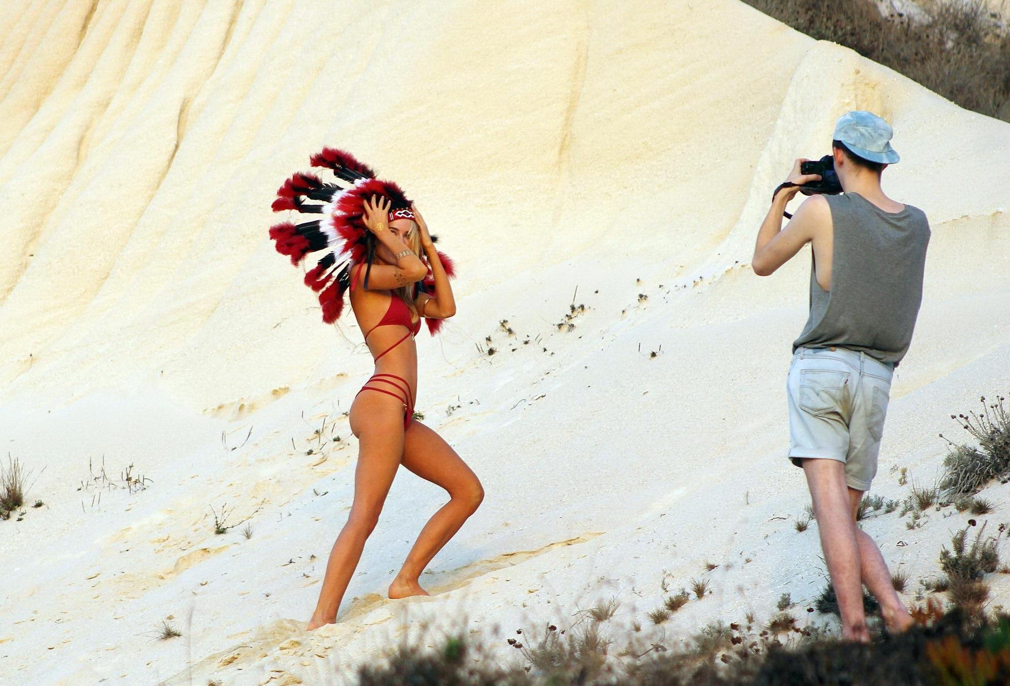 16P Kimberley Garner showing off her bikini body at the photoshoot in Southern Calif
