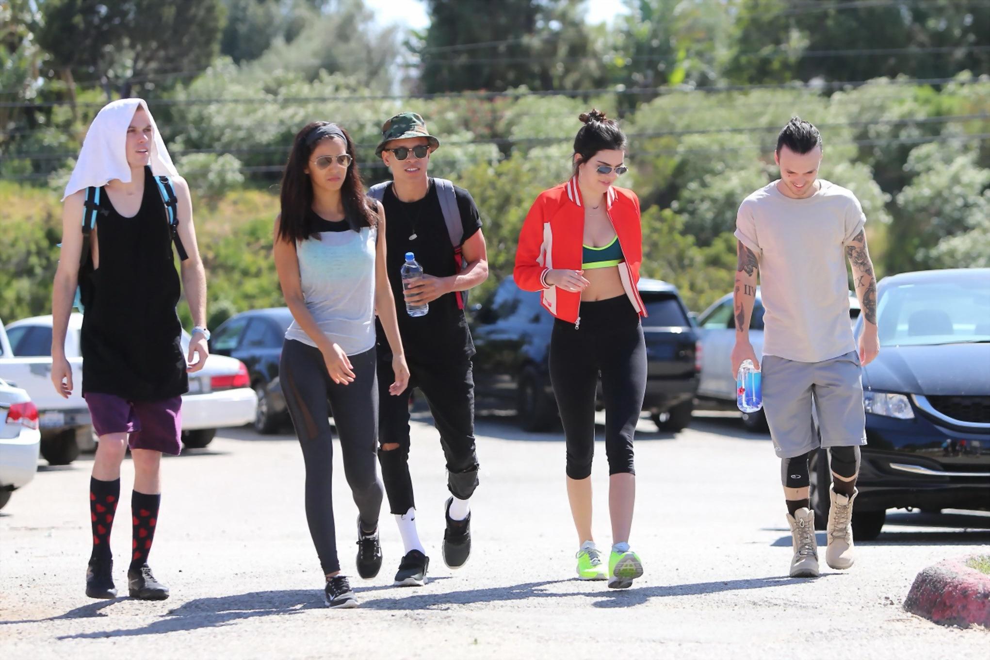 11P Kendall Jenner wearing tiny sports bra and tights while hiking in Malibu