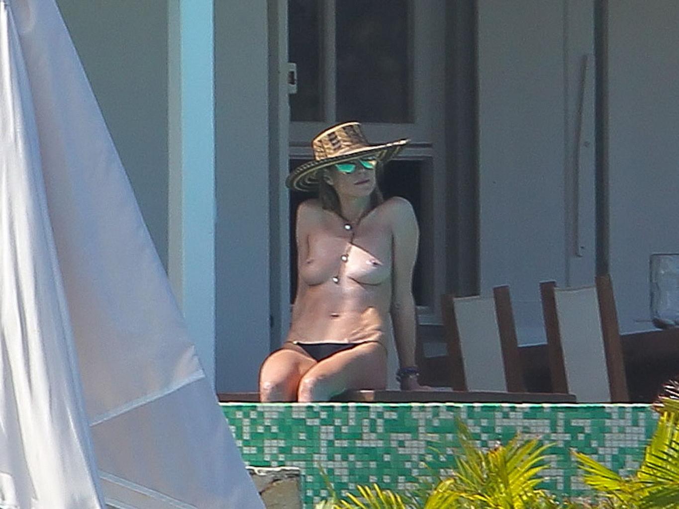 16P Heidi Klum caught topless wearing only black panties while on vacation in StBart