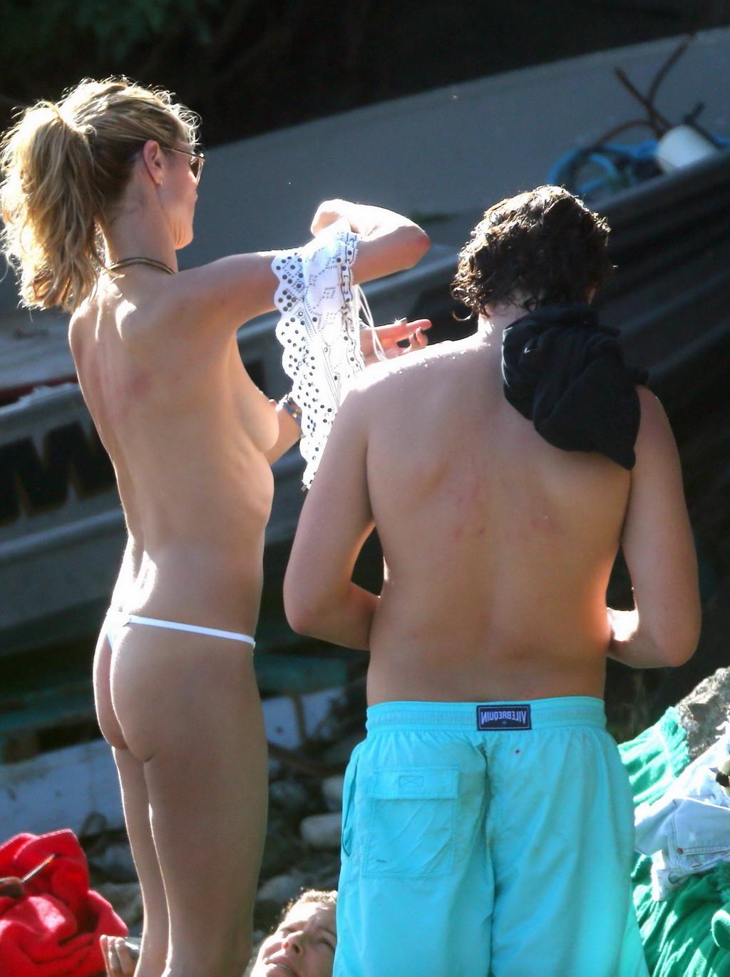 16P Heidi Klum caught topless in a white thong during a vacation in StBarts