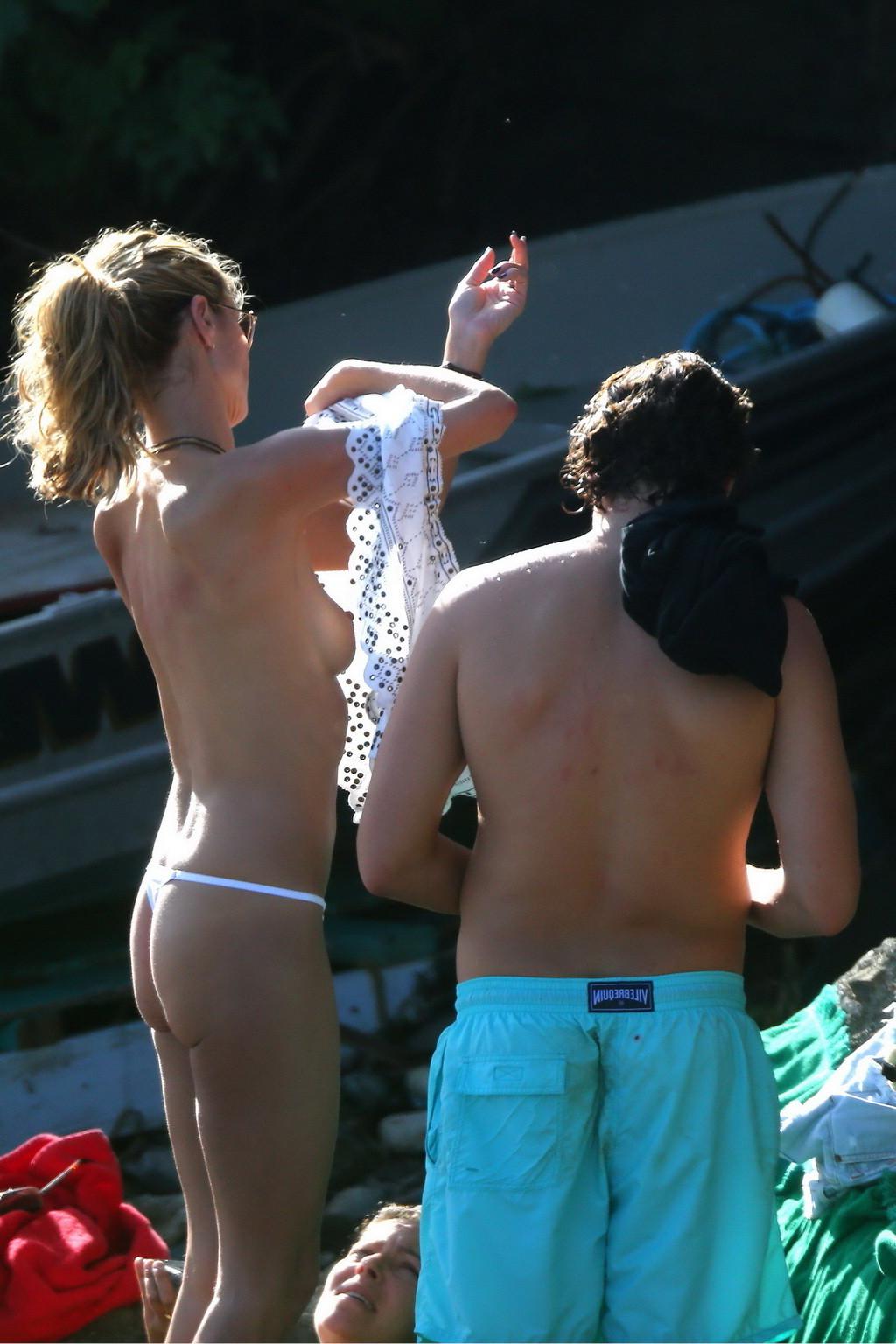 16P Heidi Klum caught topless in a white thong during a vacation in StBarts