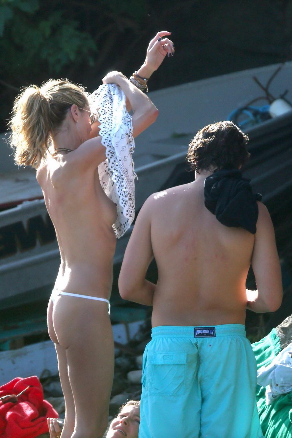 16P Heidi Klum caught topless in a white thong during a vacation in StBarts