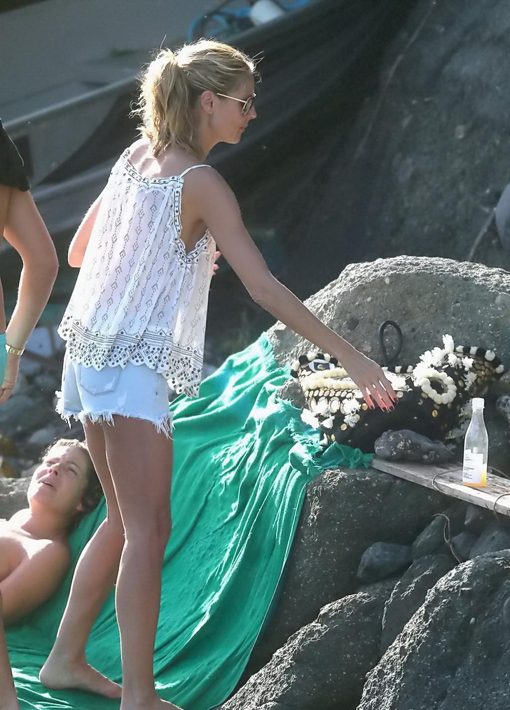 16P Heidi Klum caught topless in a white thong during a vacation in StBarts