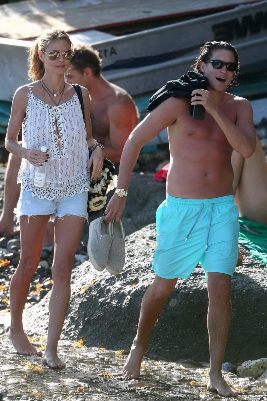 16P Heidi Klum caught topless in a white thong during a vacation in StBarts