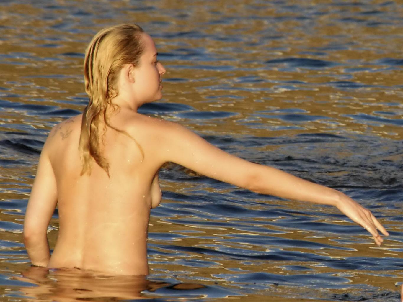 16P Dakota Johnson caught topless at the beach during a vacation in Italy