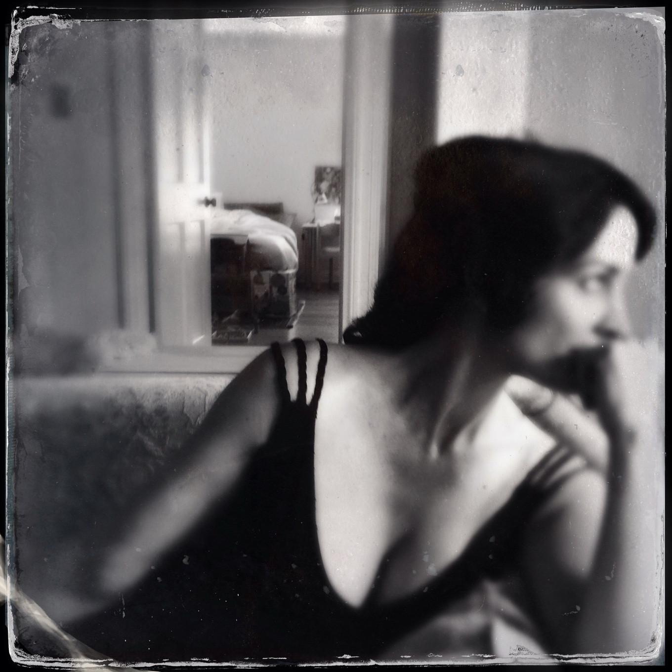16P Busty CarrieAnne Moss wearing a low cut black dress in Catherine Just Photoshoot
