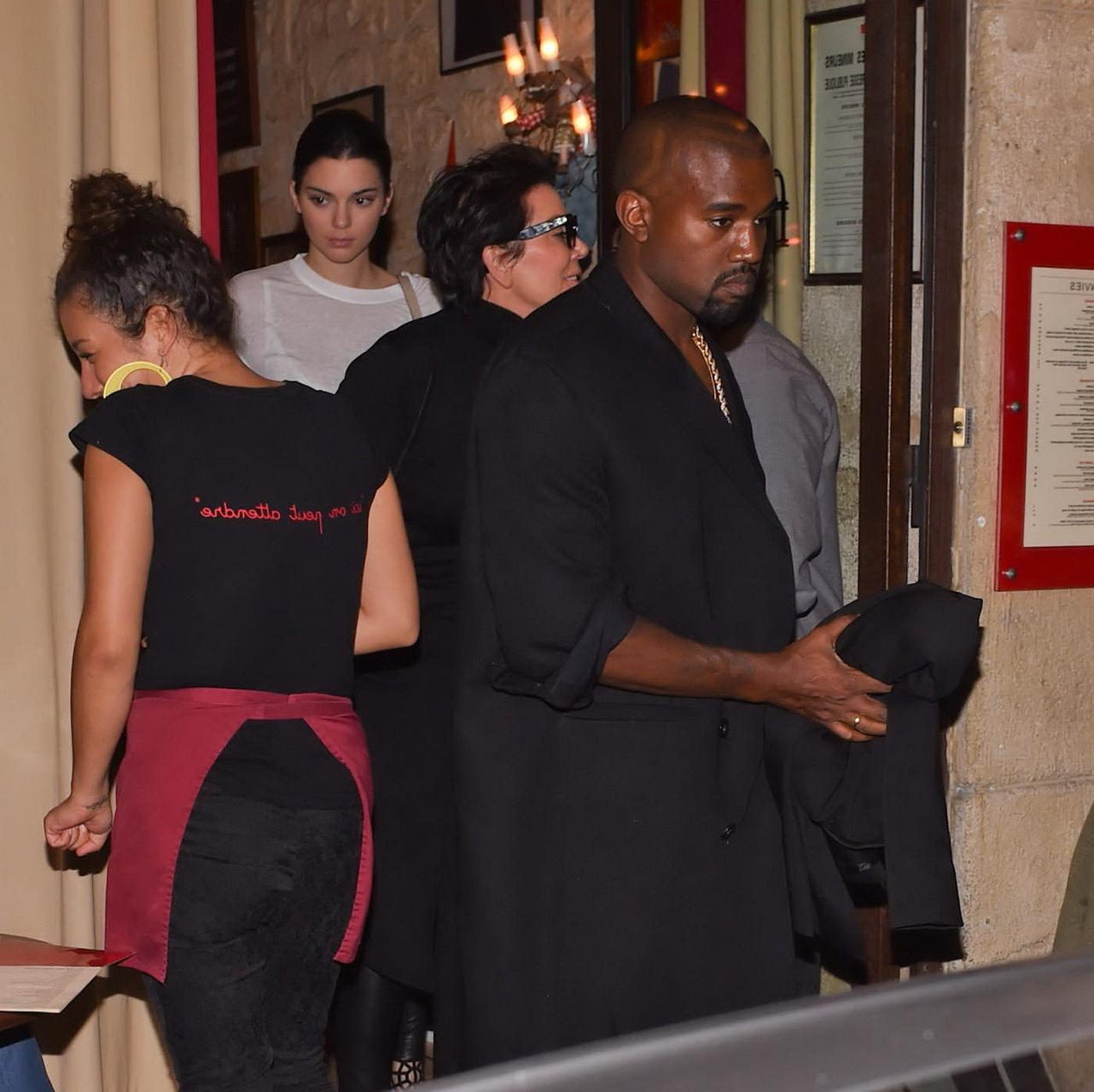 10P Kendall Jenner caught seethru to bra while leaving Fendi Restaurant in Paris