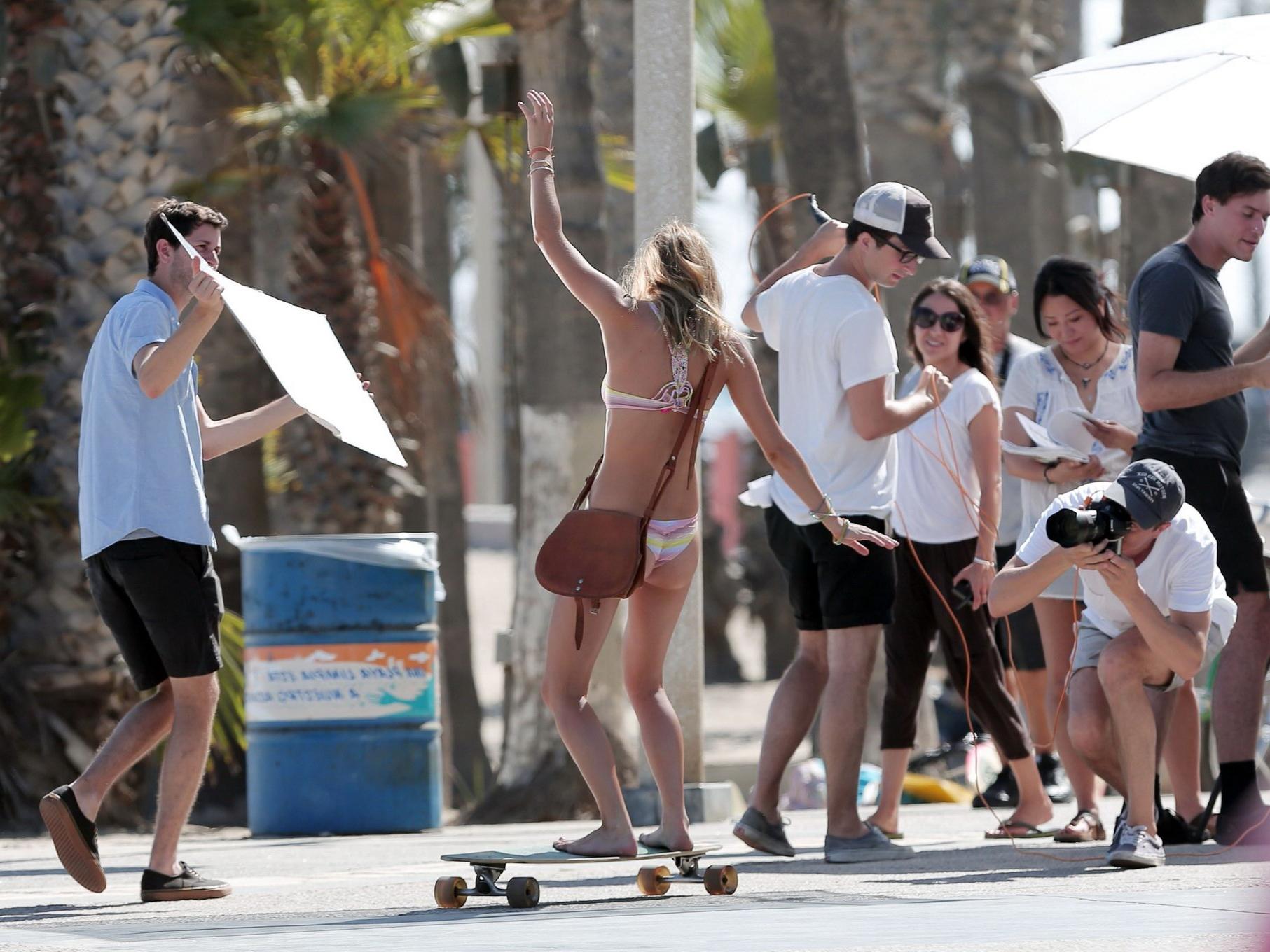 16P Camille Rowe showing off her ass at the bikini photoshoot in LA