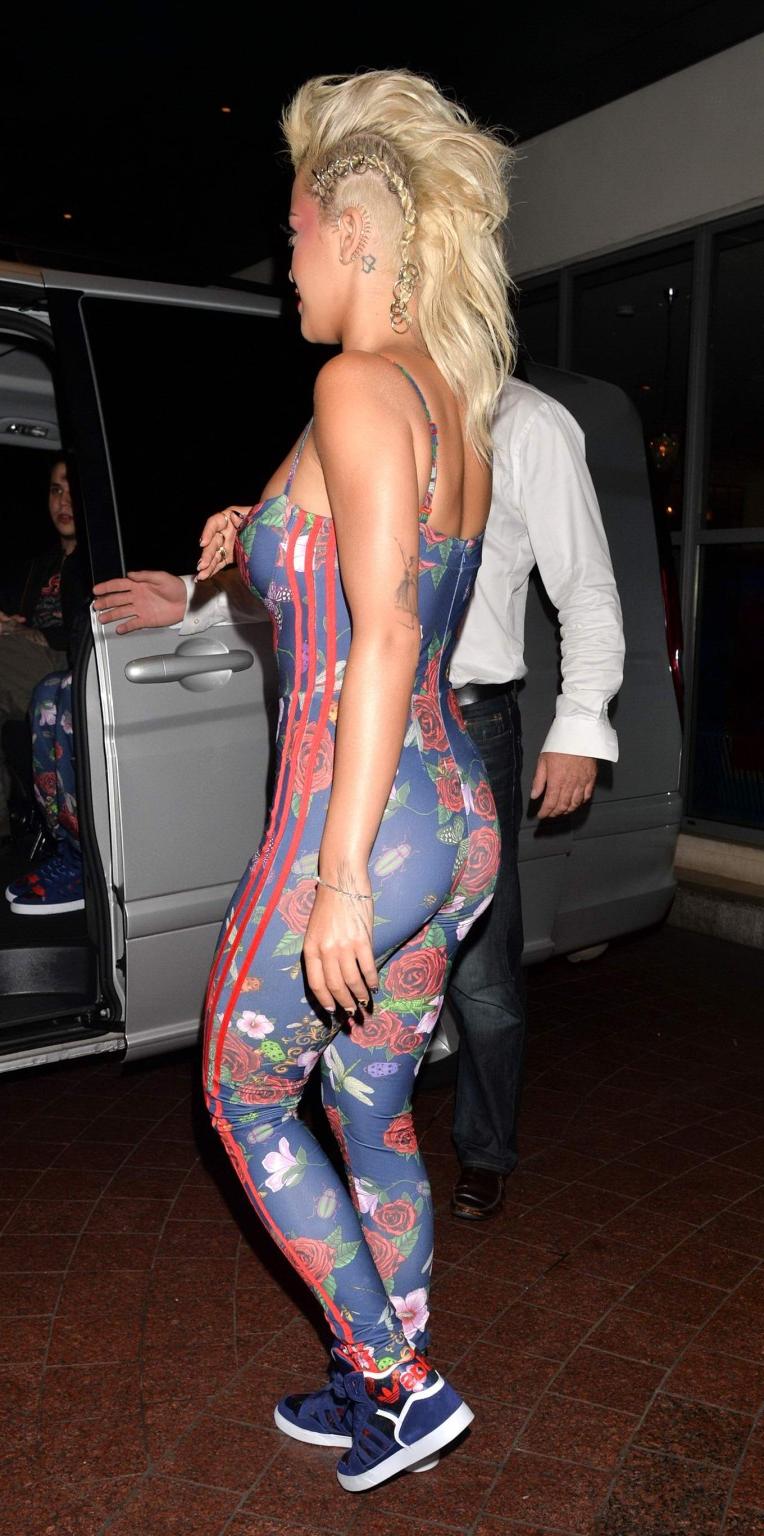 16P Rita Ora shows off her ass and cleavage wearing a catsuit at the Adidas Original