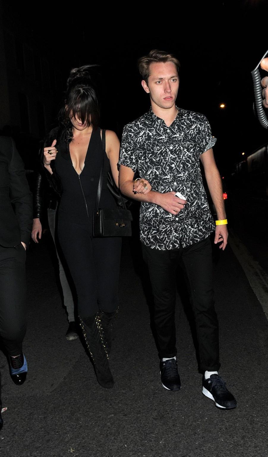 10P Daisy Lowe shows huge cleavage wearing a catsuit at Shoreditch House in London