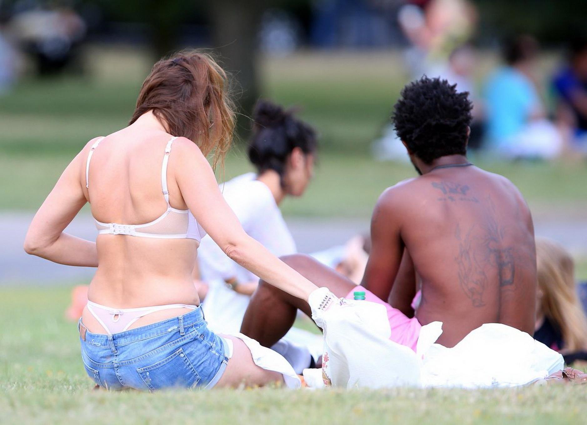 16P Lisa Snowdon caught while tanning in a thong lingerie at Finsbury Park in London