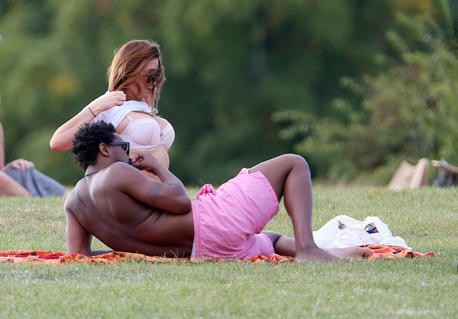 16P Lisa Snowdon caught while tanning in a thong lingerie at Finsbury Park in London