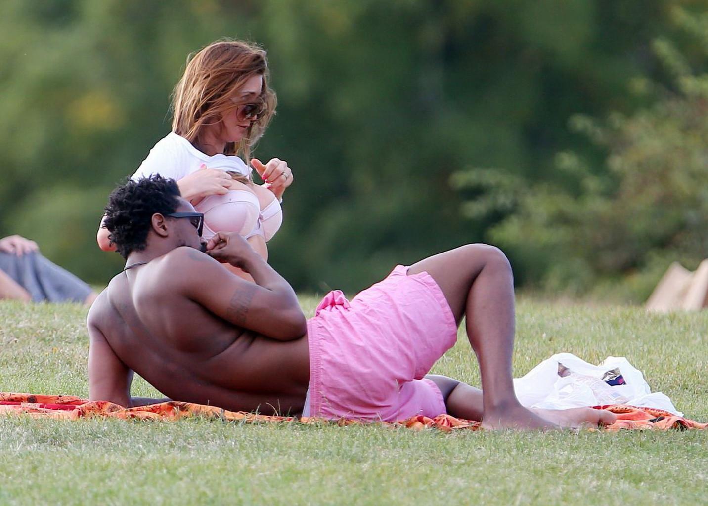16P Lisa Snowdon caught while tanning in a thong lingerie at Finsbury Park in London