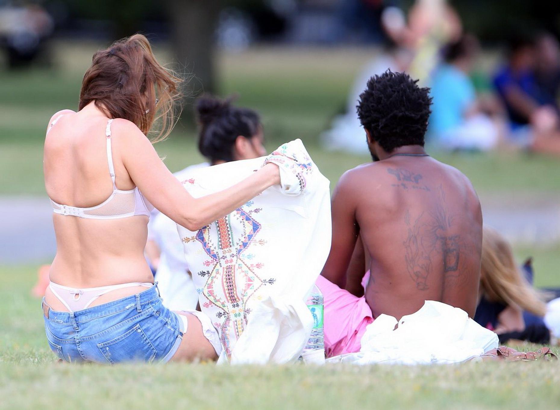 16P Lisa Snowdon caught while tanning in a thong lingerie at Finsbury Park in London