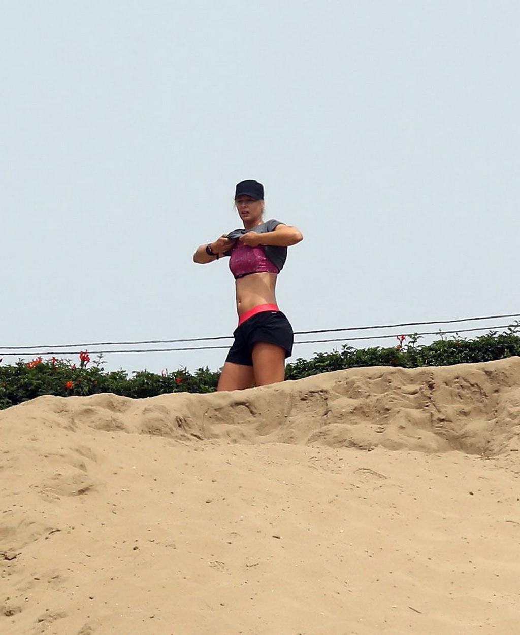 10P Maria Sharapova shows off her abs wearing a sports bra for a hike in California