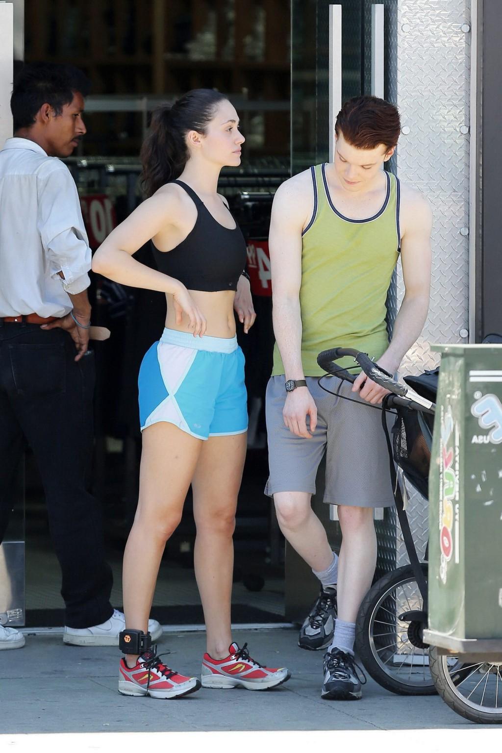 16P Emmy Rossum wearing black sport bra and shorts on the set of Shameless in Los An