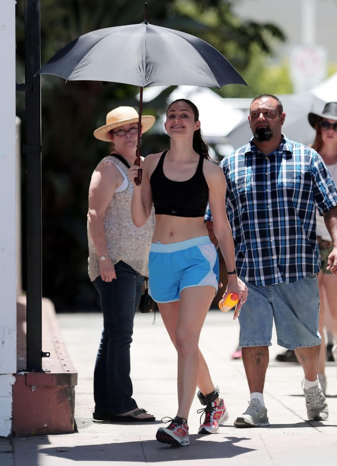 16P Emmy Rossum wearing black sport bra and shorts on the set of Shameless in Los An