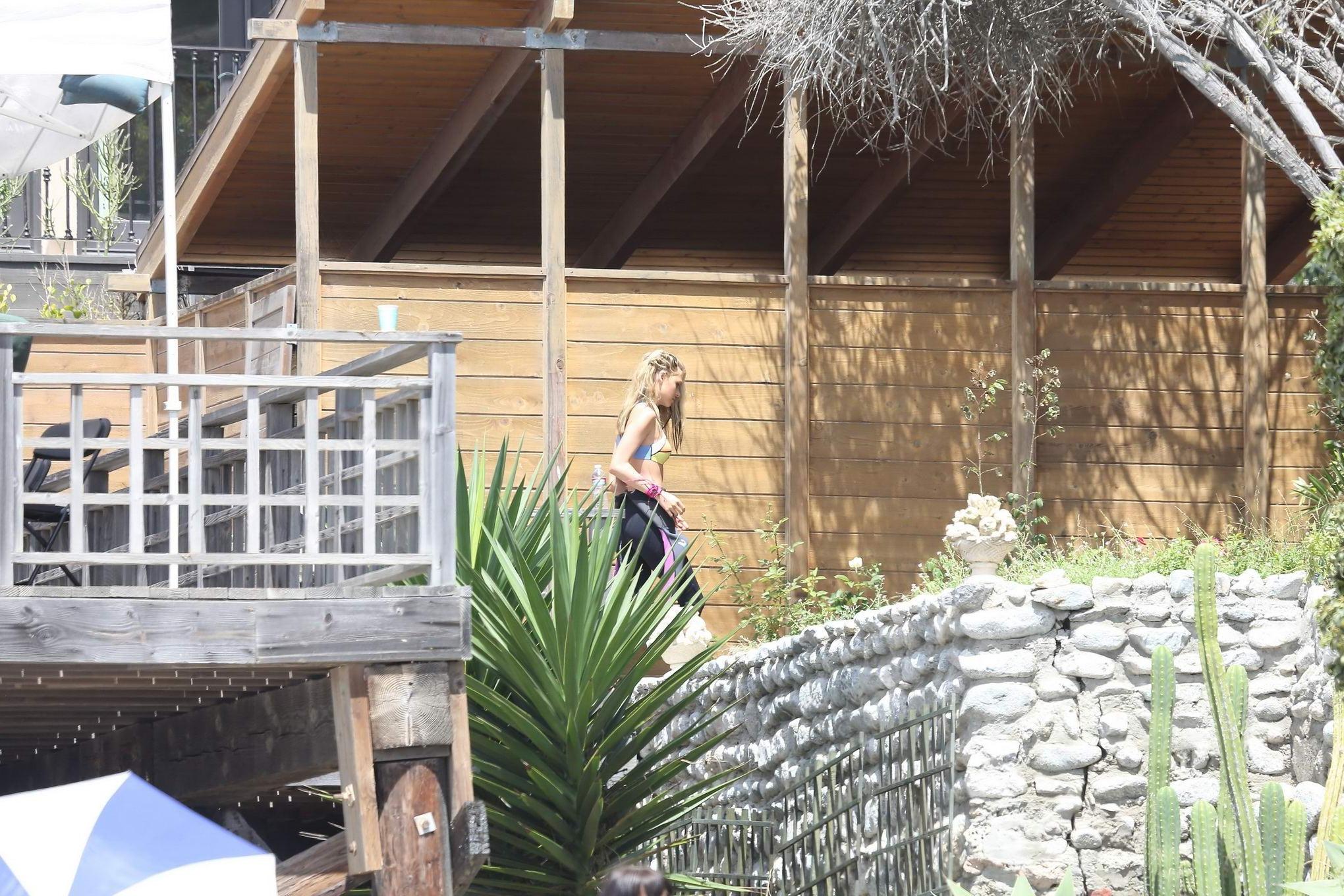 16P Nicola Peltz hot bikini and surfwear photoshoot for Teen Vogue Magazine in Malib