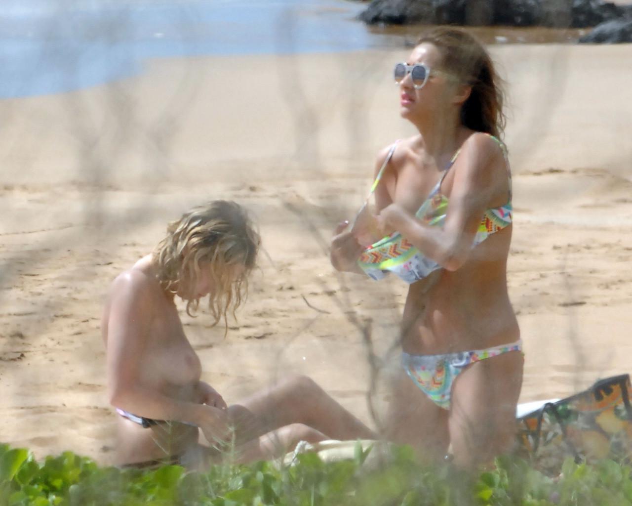 16P Ashley Benson caught topless at the beach in Hawaii