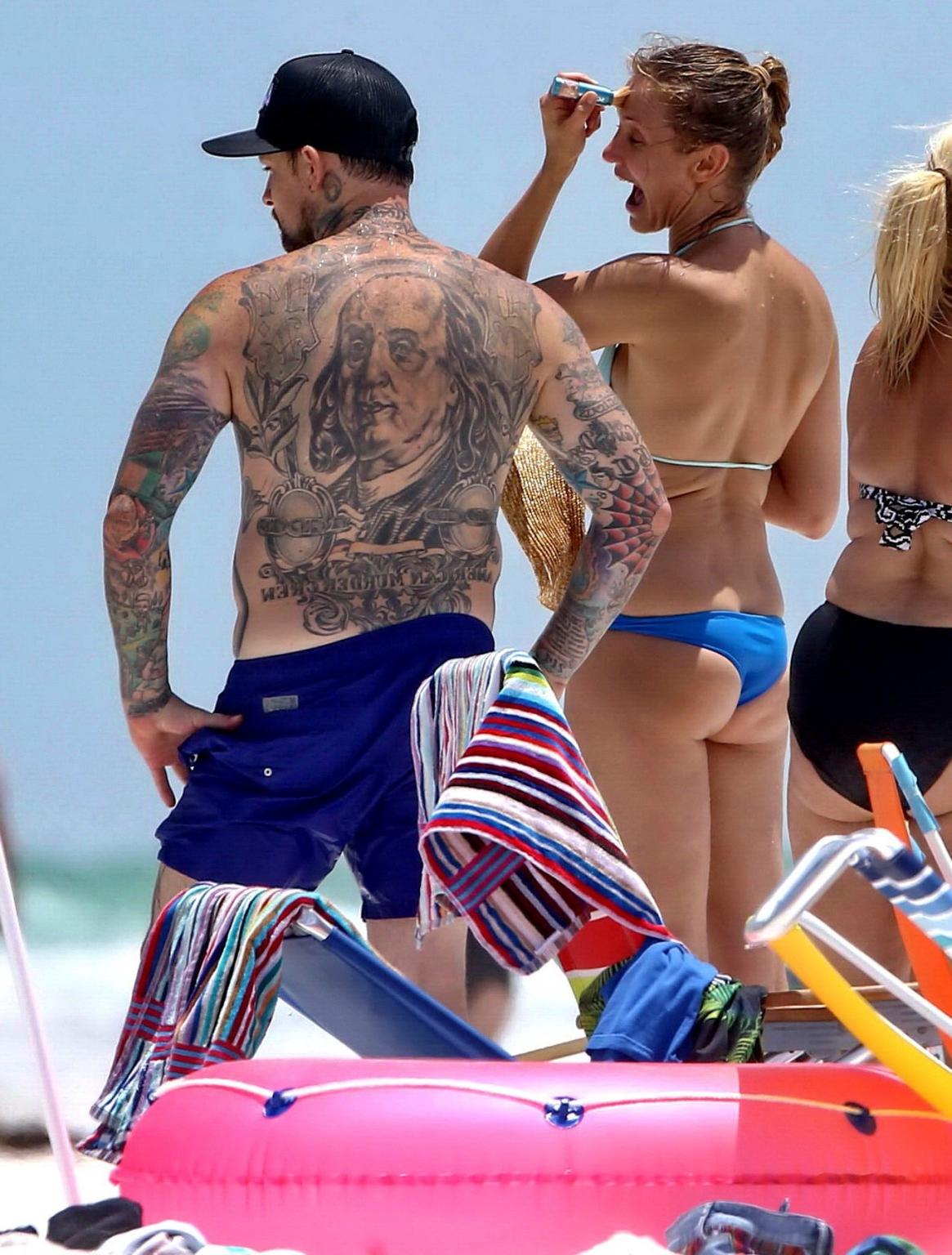 16P Cameron Diaz shows ass crack wearing a skimpy bikini on a beach in Florida