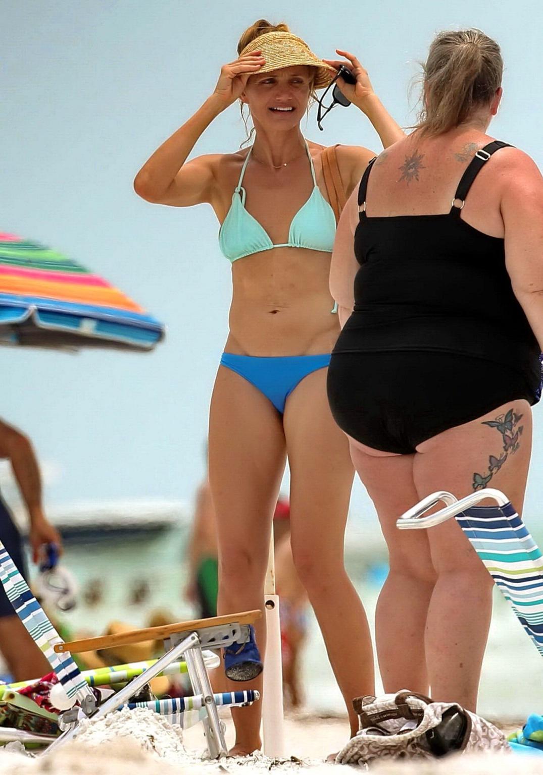 16P Cameron Diaz shows ass crack wearing a skimpy bikini on a beach in Florida