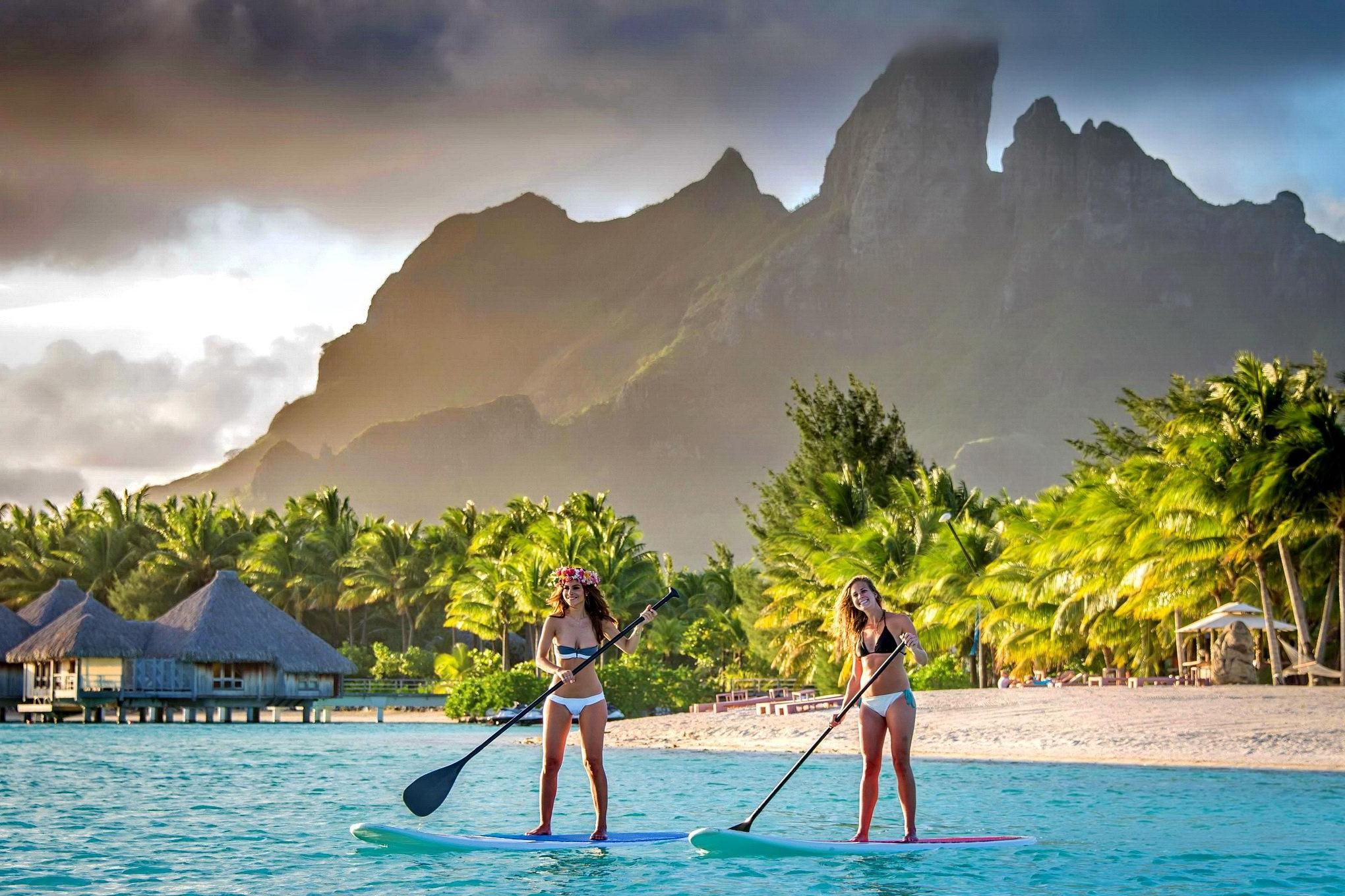 16P Maria Menounos wearing two sexy bikini sets at the photoshoot in Bora Bora