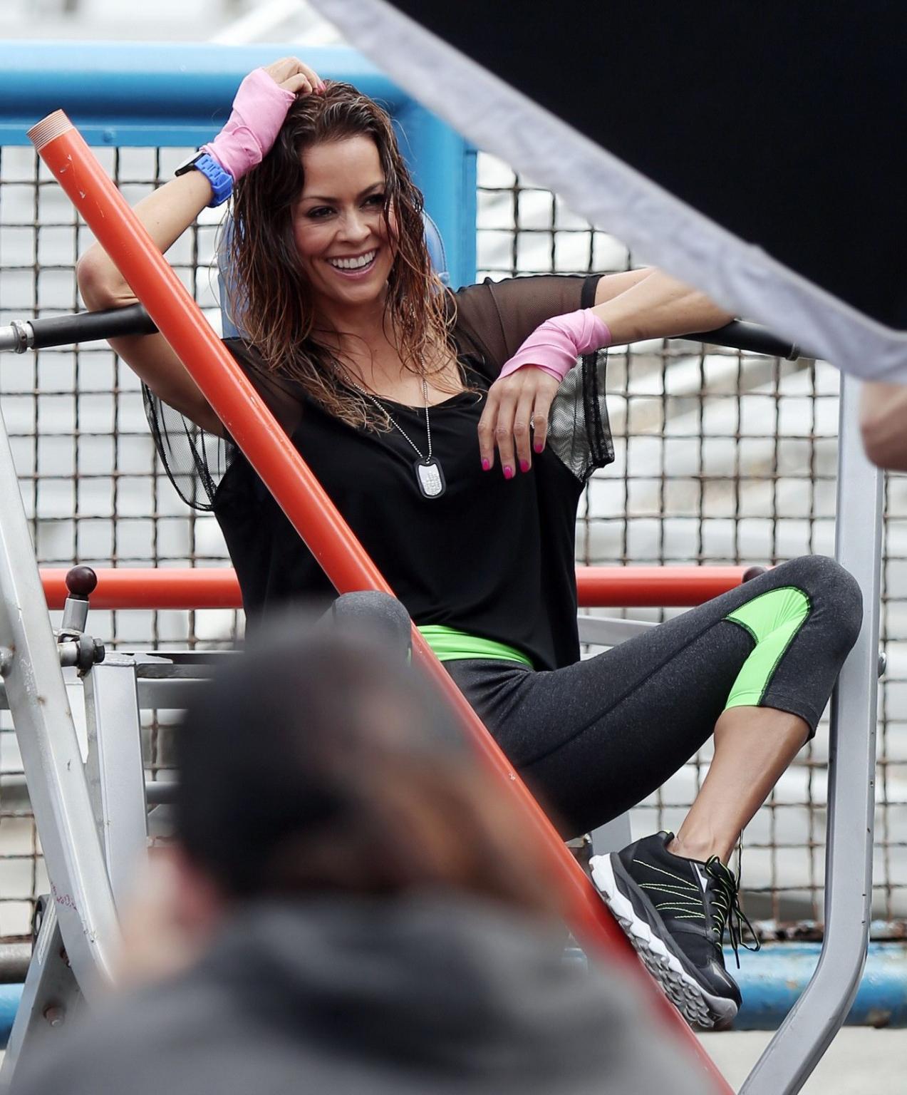 16P Brooke Burke wearing a sports bra on the set of a Sketchers photoshoot in LA