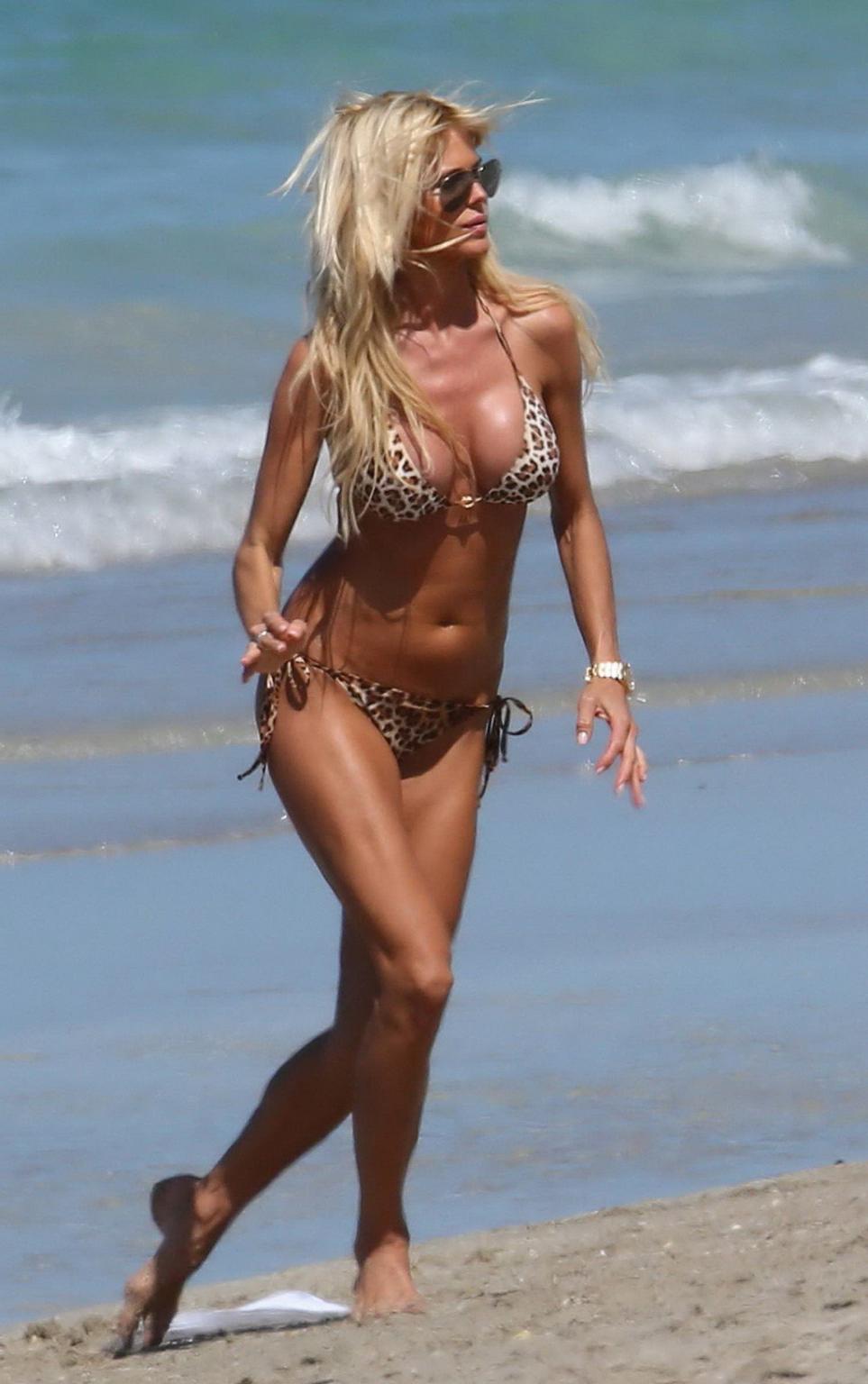 16P Victoria Silvstedt caught in a tiny leopard print bikini at the beach in Miami