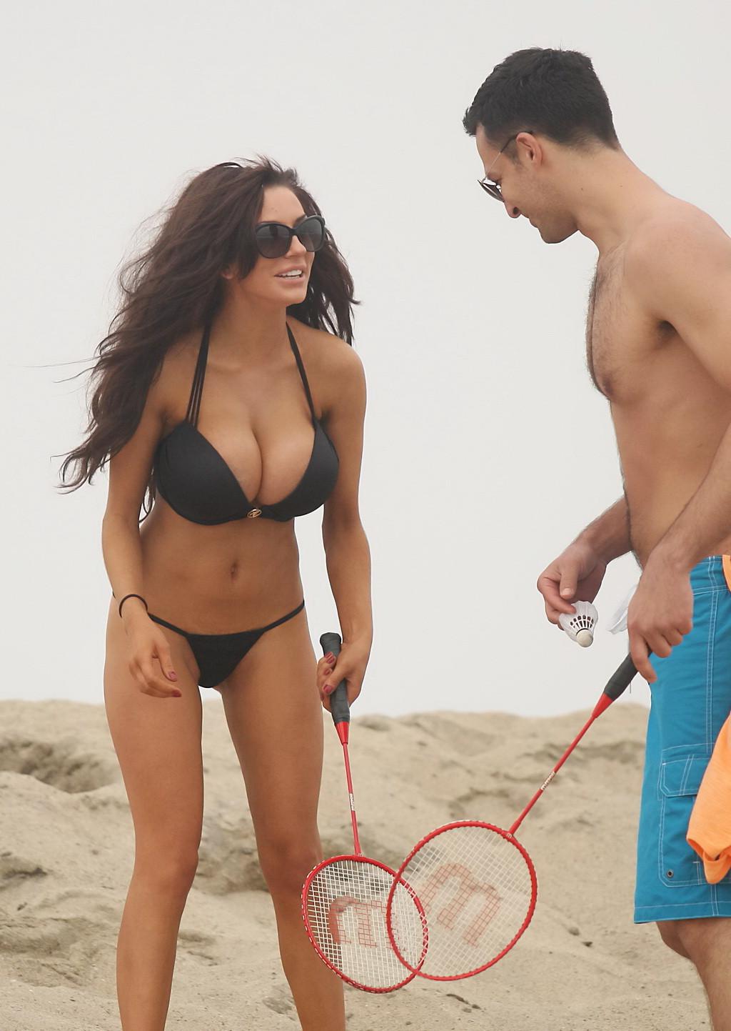 16P Courtney Stodden slips out her tiny black bikini while engaged in sports at LA B