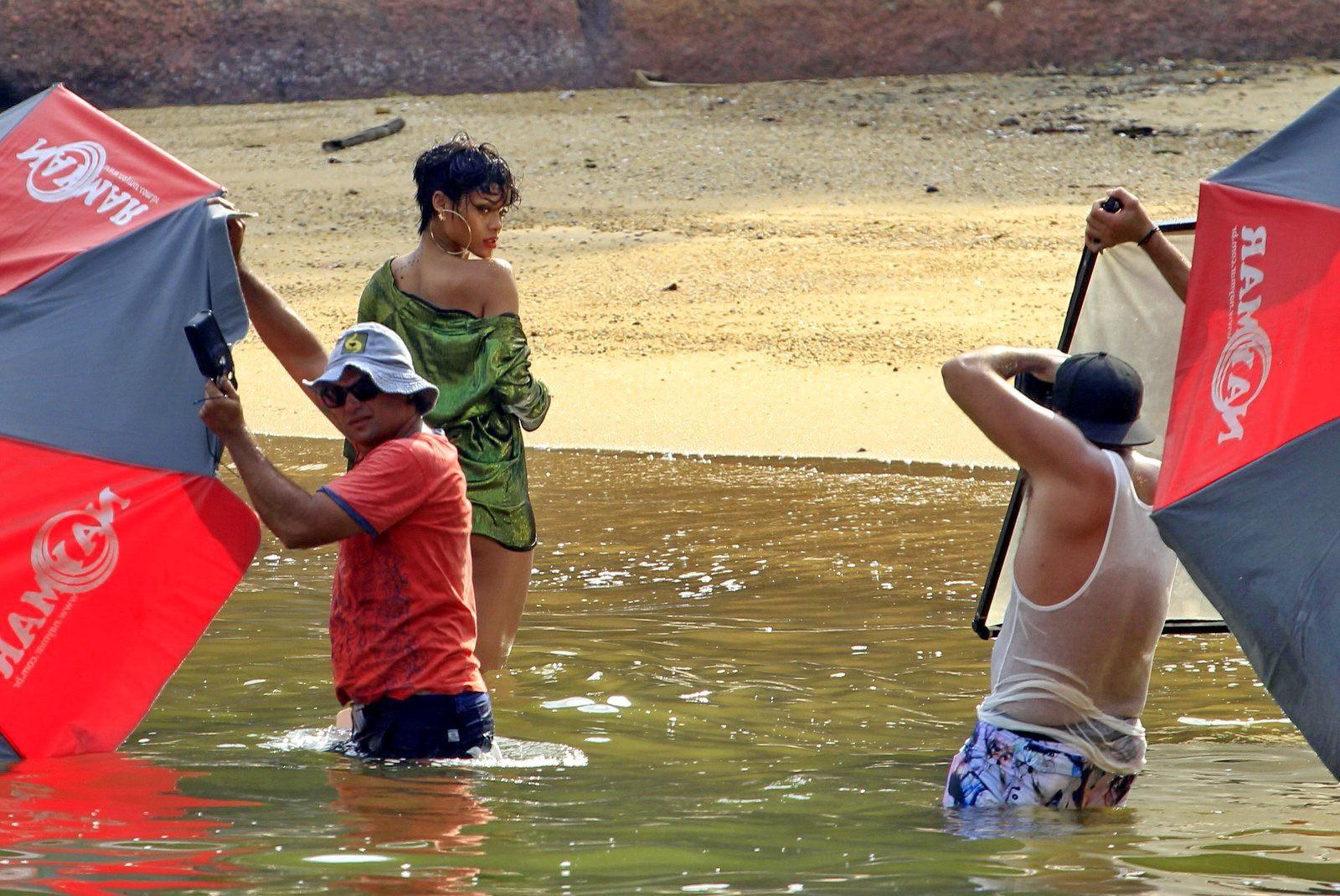 16P Rihanna showing off her boobs on the set of a photoshoot for Vogue Brasil in Ang