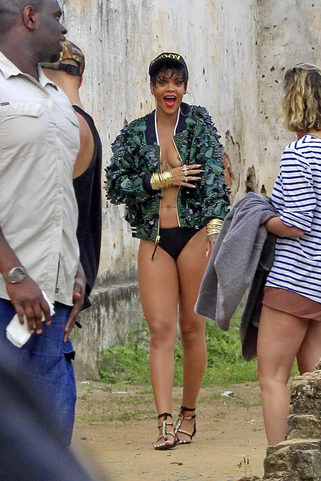 16P Rihanna showing off her boobs on the set of a photoshoot for Vogue Brasil in Ang