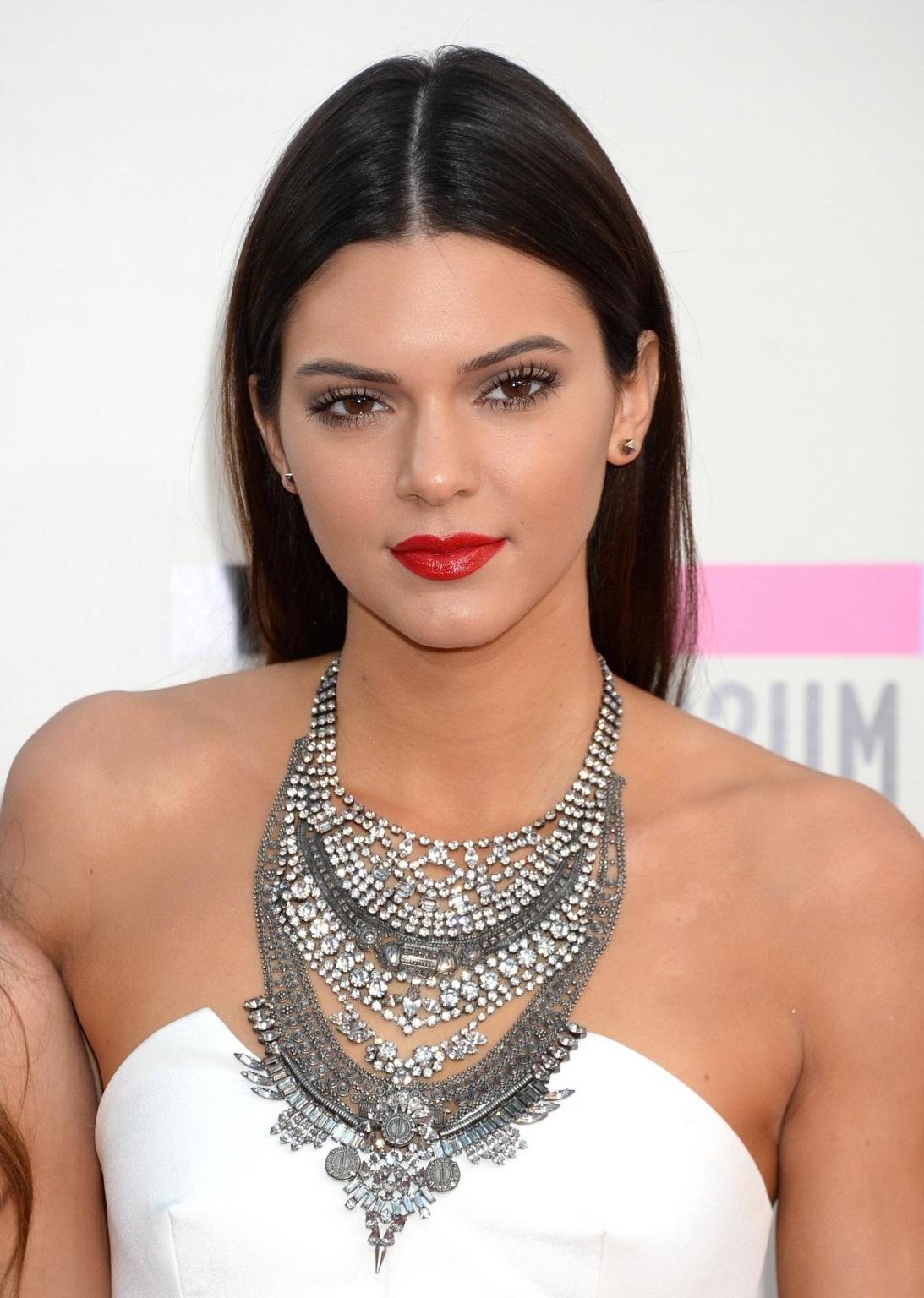 16P Kendall Jenner wearing tiny white mini dress at 2013 American Music Awards in Lo