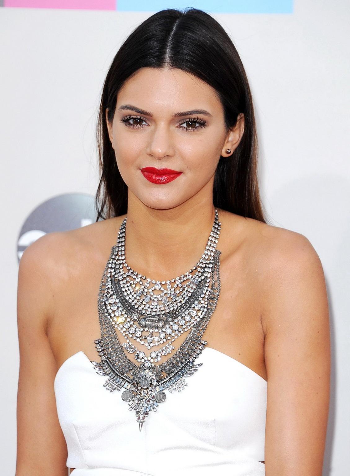 16P Kendall Jenner wearing tiny white mini dress at 2013 American Music Awards in Lo