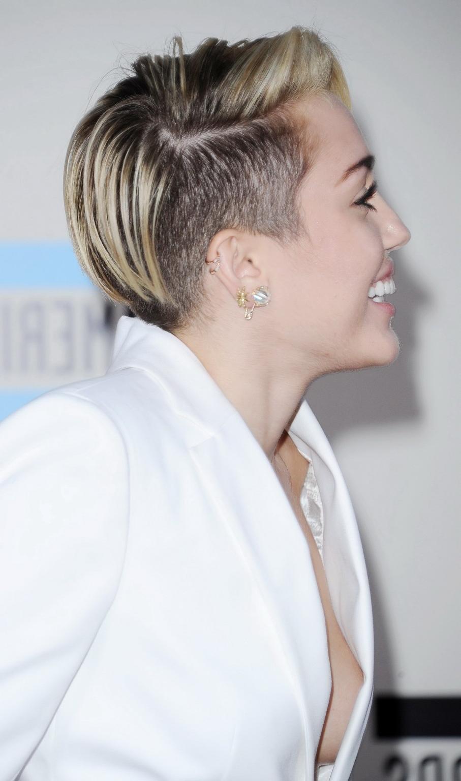 16P Miley Cyrus braless showing great cleavage in a white suit at 2013 American Musi