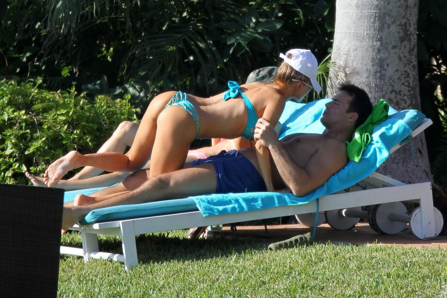 16P Joanna Krupa in a blue tube bikini humping and kissing Romain Zago poolside in M