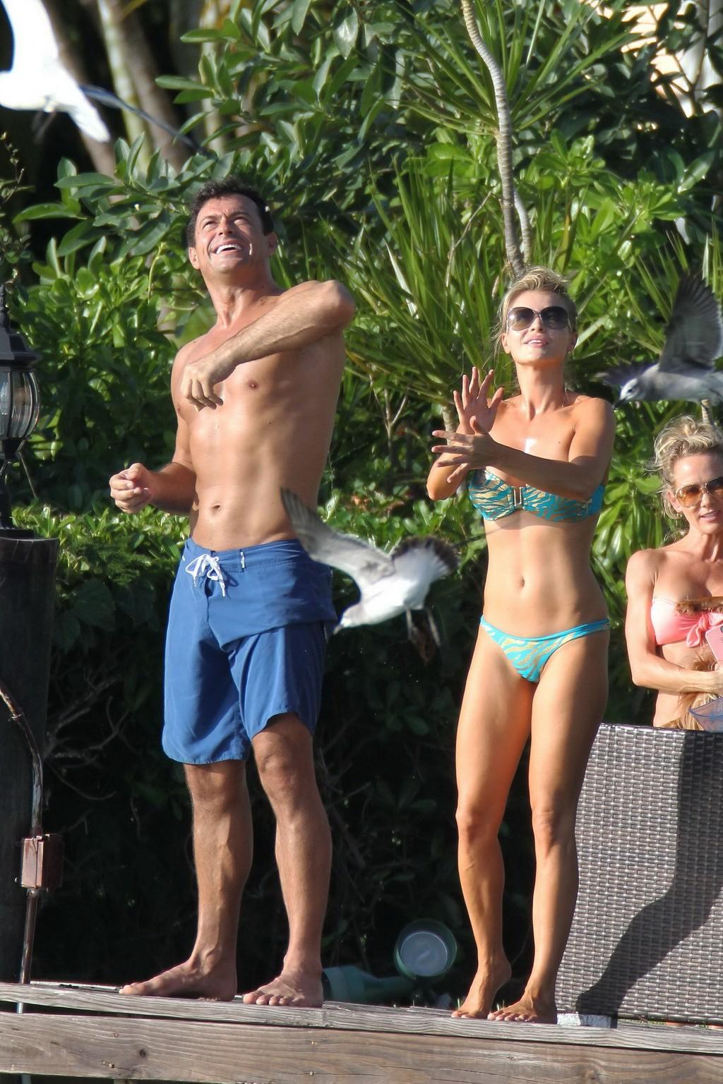 16P Joanna Krupa in a blue tube bikini humping and kissing Romain Zago poolside in M