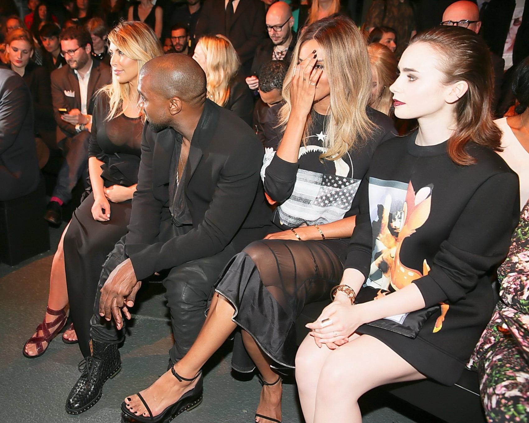 16P Kim Kardashian caught see-through to bra while leaving Givenchy Fashion Show in 