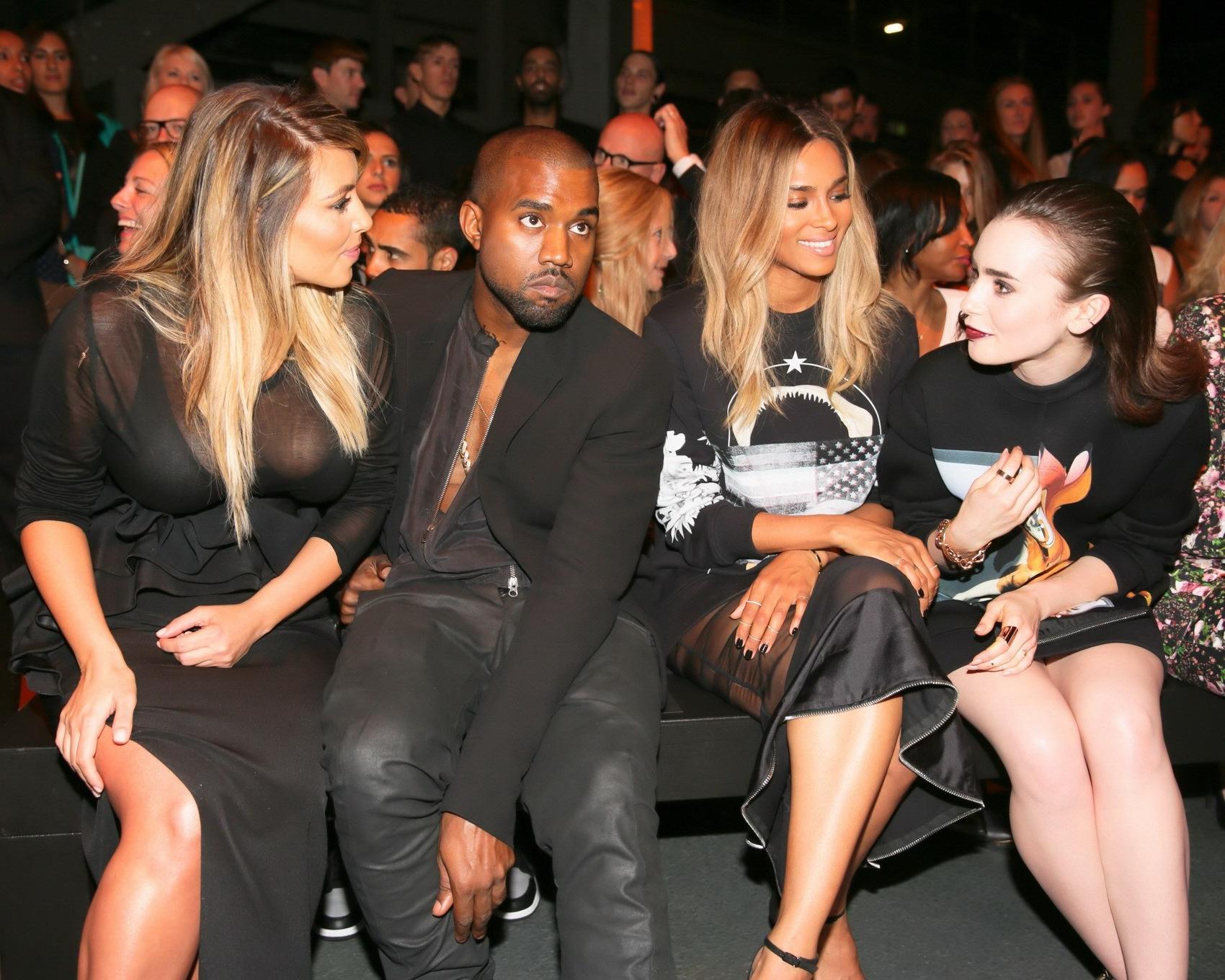 16P Kim Kardashian caught see-through to bra while leaving Givenchy Fashion Show in 
