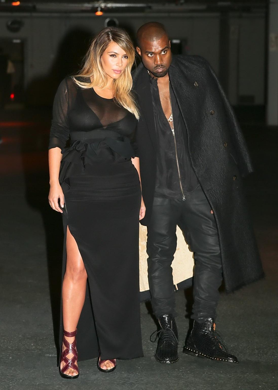 16P Kim Kardashian caught see-through to bra while leaving Givenchy Fashion Show in 